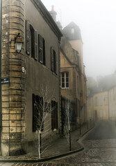 Winter fog in th streets of Bayeux, France.