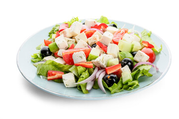Plate with fresh Greek salad on white background