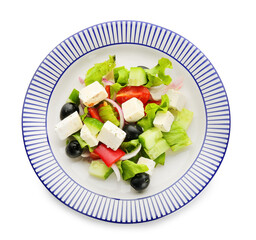 Plate with fresh Greek salad on white background
