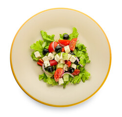 Plate with fresh Greek salad on white background