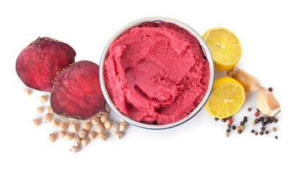 Bowl with tasty beet hummus and spices on white background