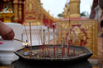 incense sticks in a buddhist temple