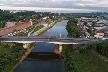 The Dnieper River in the cityscape on a July morning (aerial photography). Smolensk, Russia