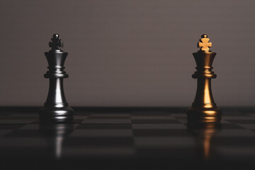 Closeup of chess characters on board games. to represent decision making in term of business strategy to find out the best solution to meet target objective and goal.	
