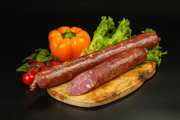 Pork ham sausage cut isolated