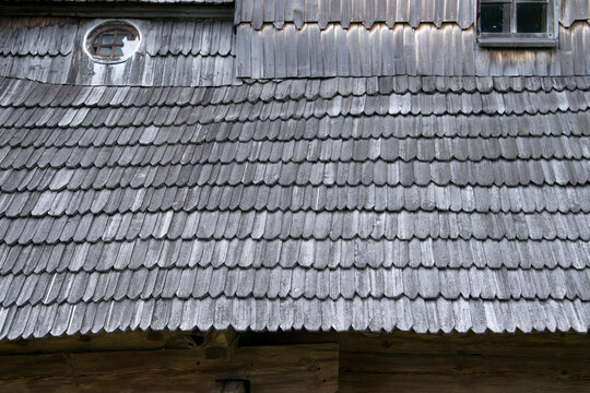 close up of very old wooden church roof as nice grey background