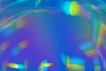 Abstract neon glowing textured iridescent gradient background.