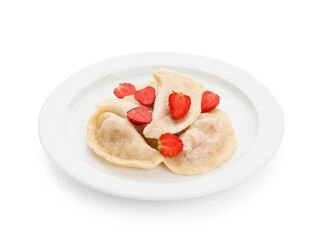 Plate with tasty dumplings and strawberry on white background