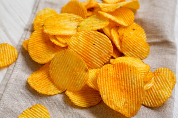 Ruffled Cheese Potato Chips, side view.