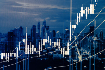 Abstract financial trading graphs and digital number of foreign exchange market trading on monitor. Background of gold and blue digital chart to represent stock market trend.