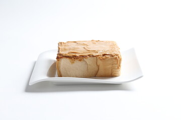 thick peanut butter toast in white background snack halal menu