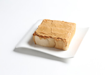 thick peanut butter toast in white background snack halal menu