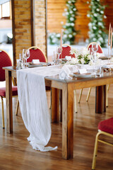 Wedding. Banquet. Luxury rich table setting for a wedding celebration, party in nice cozy restaurant. 