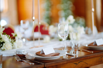 Wedding. Banquet. Luxury rich table setting for a wedding celebration, party in nice cozy restaurant. 