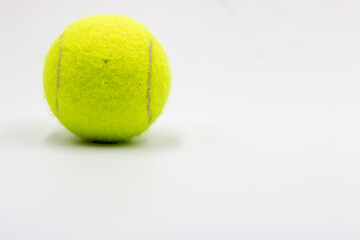 Tennis ball is on white background