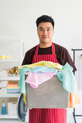 man carry laundry basket for launder