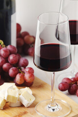 Red wine in a transparent white glass