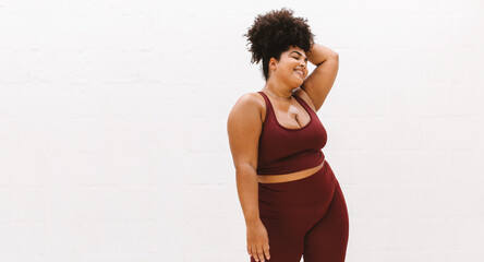 Healthy woman taking break after workout