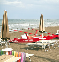 An Italian lifeboat on a beach in summer