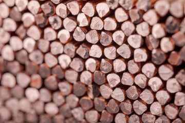 Copper wire non-ferrous metals, product metalworking industry. Abstract metal shapes.