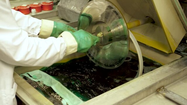 Vinyl record factory: Lacquer is dipped into a nickle bath, where an electro charge fuses the nickle to the silver.