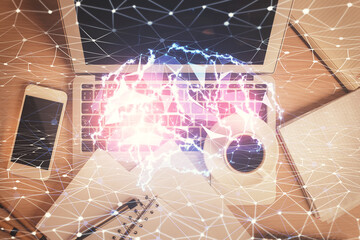 Double exposure of brain drawing hologram over topview work table background with computer. Concept of big data.
