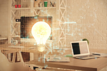 Double exposure of bulb and office interior background. Concept of idea.