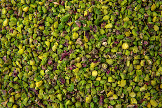 Crushed Pistachio. Healthy dietary nutritional product. Vegetable nut protein. Vegetarian balanced meal. Selective focus