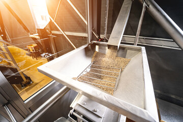 The technological process of grinding malt seeds at the mill - obrazy, fototapety, plakaty
