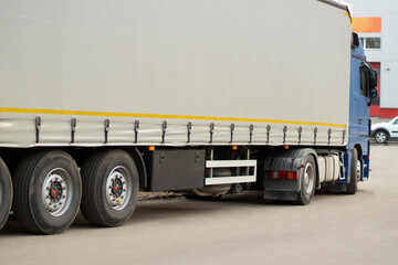 Fototapeta na wymiar Truck wheels. Transportation of goods in freight transport.