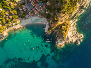 Aerial drone panorama view of the coast line, beach and crystal clear water of elba close to...