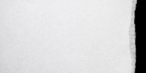 Torn open paper. Abstract rip vintage sheet frame. Old white torn paper texture isolated on black background. Crumpled backdrop surface placard with space for text.