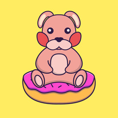 Cute rabbit is sitting on donuts.