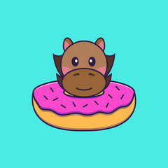 Cute horse with a donut on his neck.