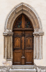 Door on the facade of the urban historic building front view, Tallinn, Estonia
