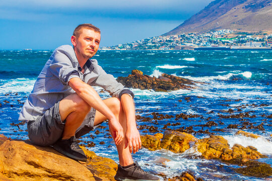 Male model tourist traveler coast landscape Cape Town South Africa.