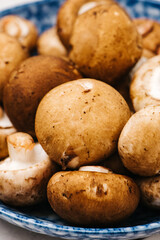 Raw Cremini Mushrooms in a bowl