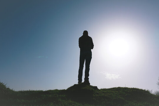 man hikking in the mountain in summertime
