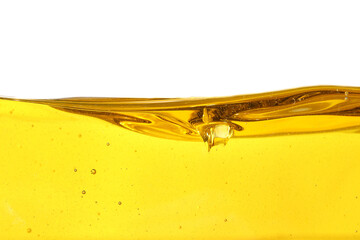 Vegetable oil and air bubbles inside oil isolated on white background.