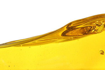 Vegetable oil and air bubbles inside oil isolated on white background.