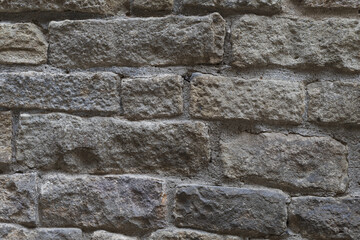 Grey stone wall brick texture, rough ashlar background