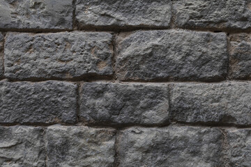 Grey stone wall brick texture, rough ashlar background