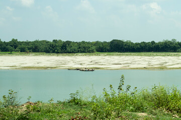 Boat floating on the water and fishermen are preparing for fishing