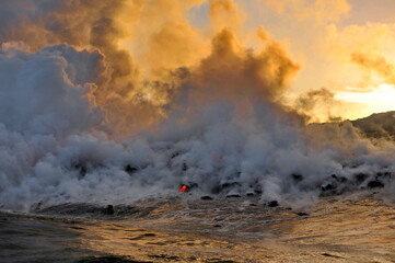 Hawaii. Volcanic eruption. Fiery lava flows into the ocean