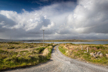 Fototapeta na wymiar landscape. Inishnee Island road on a cloudy day. Galway. Ireland