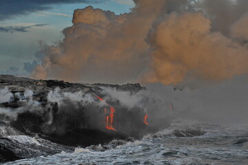 Hawaii. Volcanic eruption. Fiery lava flows into the ocean