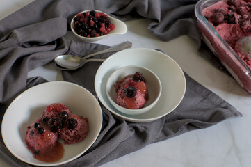Bowl with forest fruits ice cream, bowls with ice cream and bowl with frozen forest fruits
