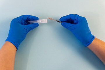 Flat Lay for medical theme and vaccinations from COVID-19. Medicine, vaccine, hands of a doctor