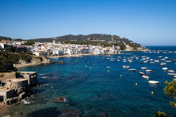 View on the village Calella de Palafrugell, bay with boats in Costa Brava, Spain