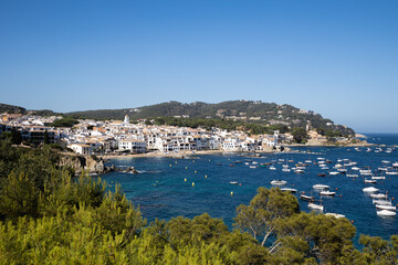Fototapeta na wymiar View on the village Calella de Palafrugell, bay with boats in Costa Brava, Spain